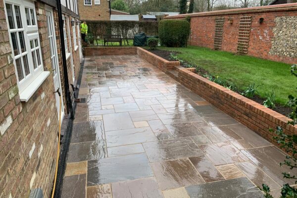 brown indian sandstone patio in harpenden