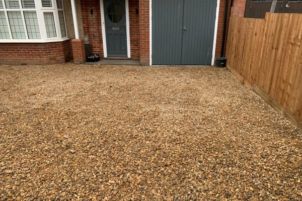 new gravel driveway that replaced old drive