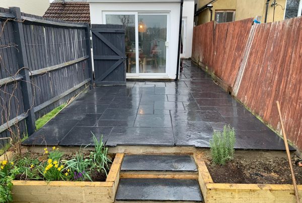 black limestone patio laid in st albans, hertfordshire