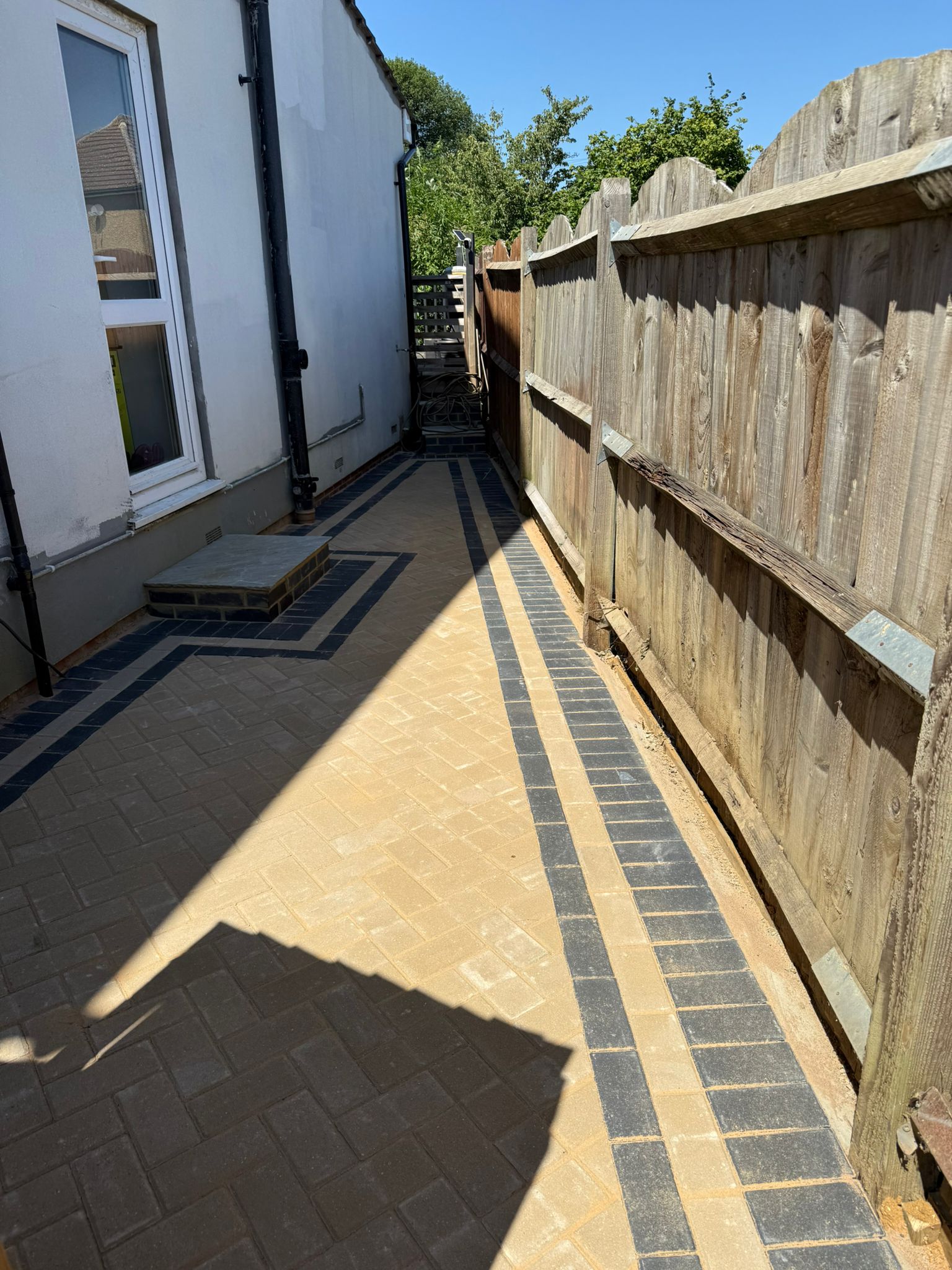 after side of house block paving laid