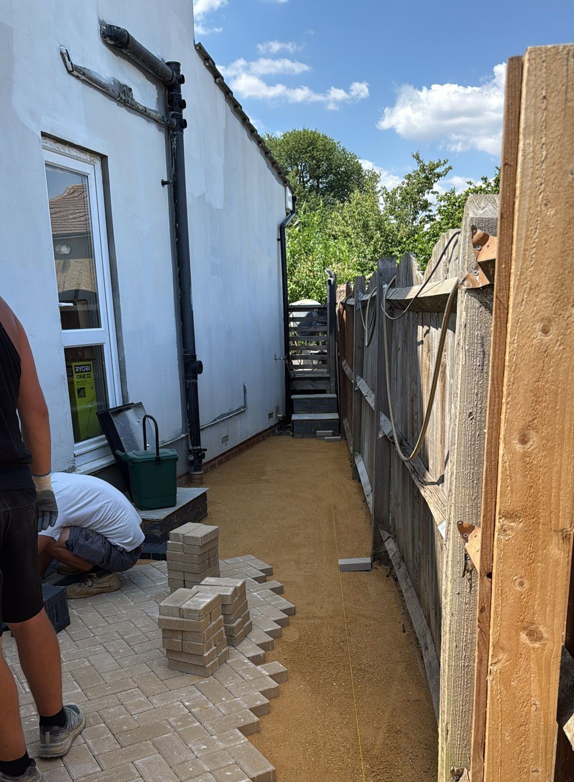 during side of house block paving driveway coombes road london colney