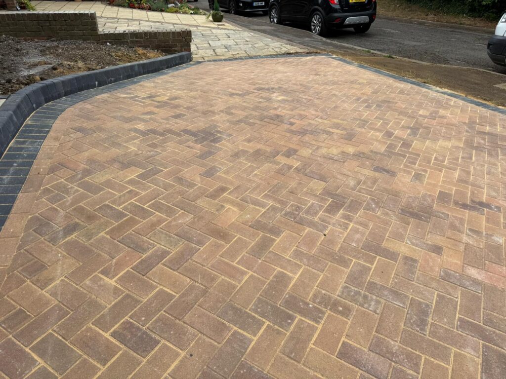 new block paved driveway with charcoal edge in Wheathampstead