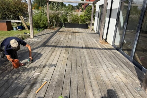 replaced old decking with new porcelain tile Patio in Harpenden