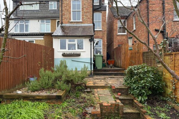 old patio replaced with sandstone paving in st albans