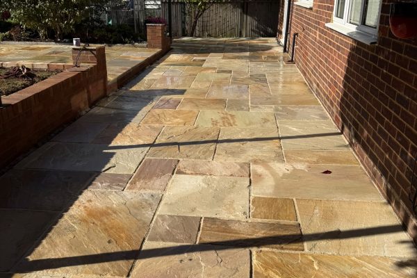 indian sandstone laid in garden patio in sandridge