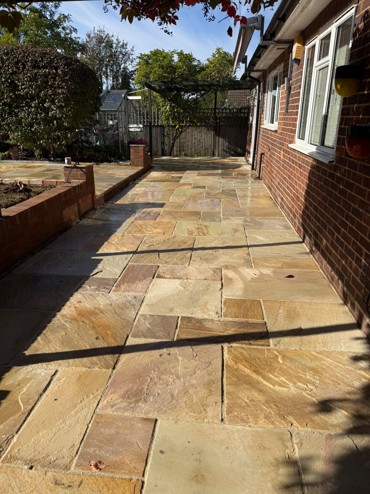 indian sandstone laid in garden patio in sandridge